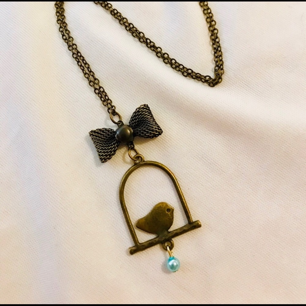 Bird ribbon bow blue antique bronze necklace - Picture 1 of 5
